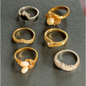 Bundle of 6 rings and 3 necklaces with one brooch